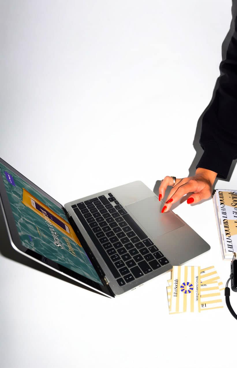 Reviewing brand guidelines on a laptop